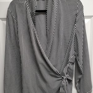 Black and white wrap blouse